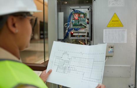 Electrician conducting a safety inspection in Riyadh